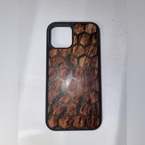 Carved iPhone 12 Pro phone case. Used only a few times.